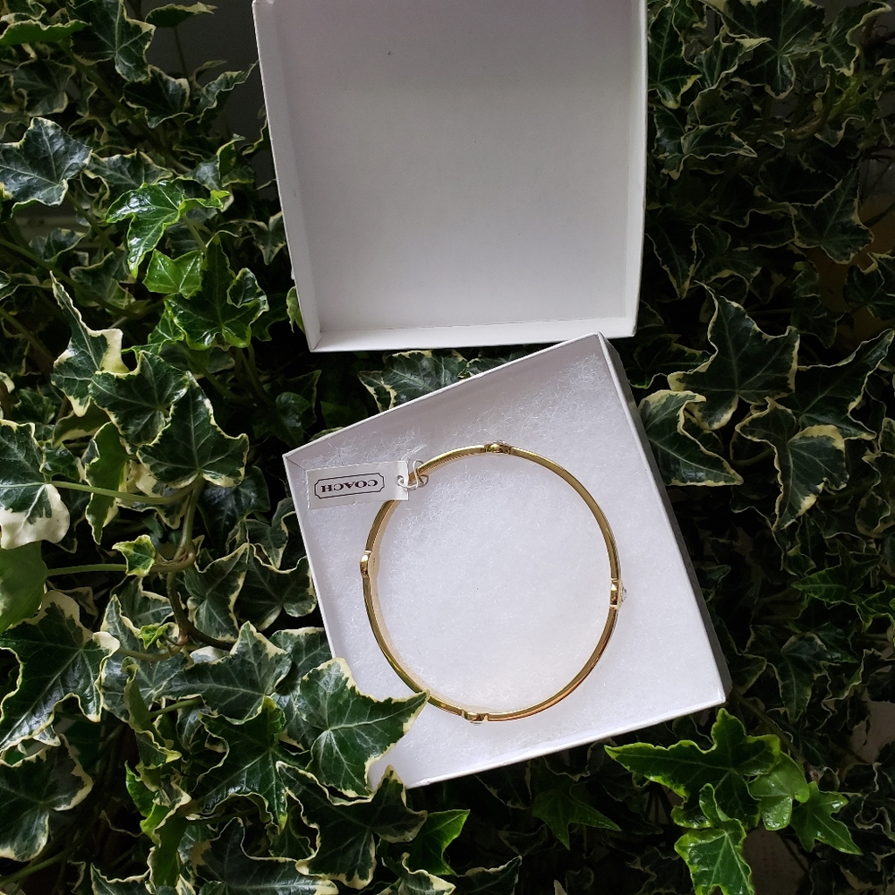 Black and Gold COACH Bangle